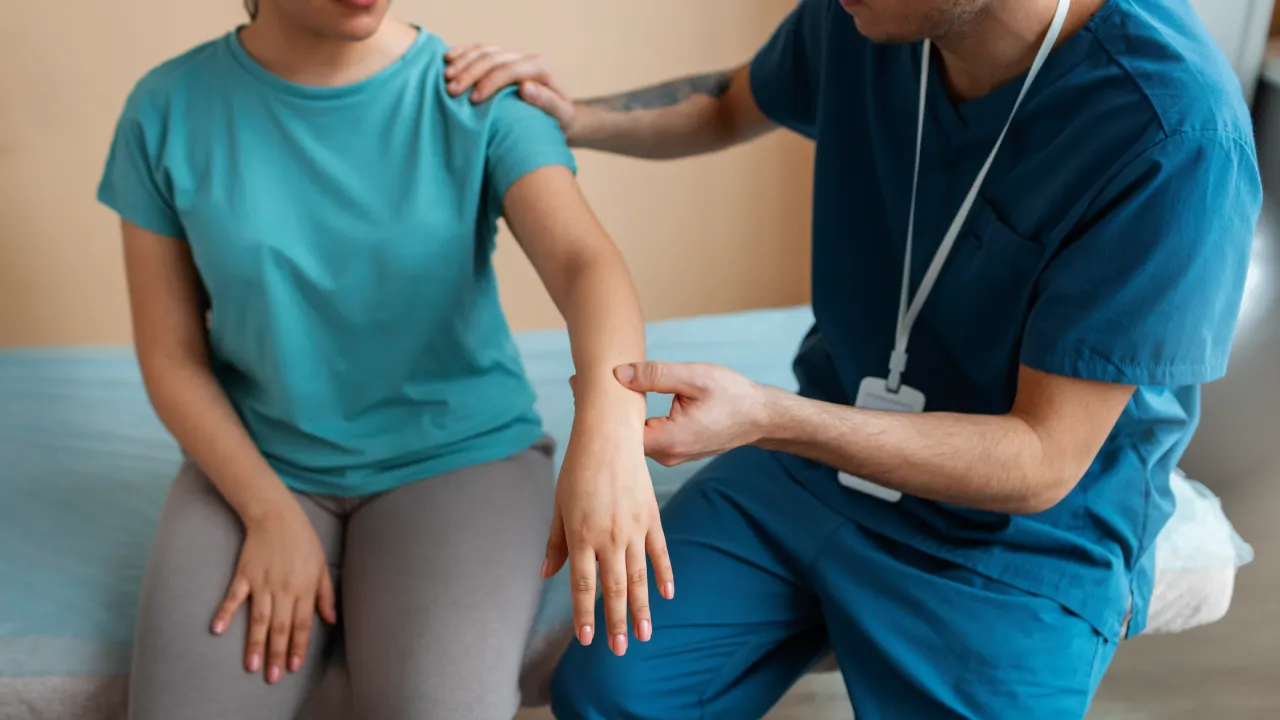 Physiotherapist providing treatment for neck pain