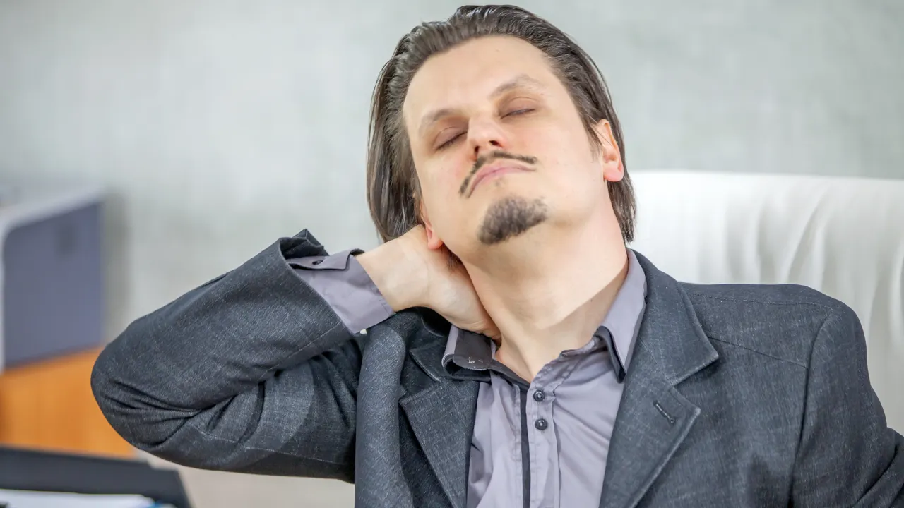 Physiotherapist providing treatment for neck pain