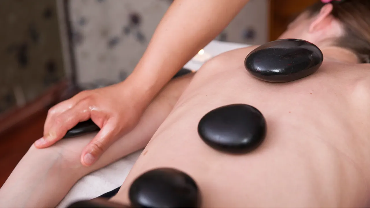 Physiotherapist providing treatment for neck pain