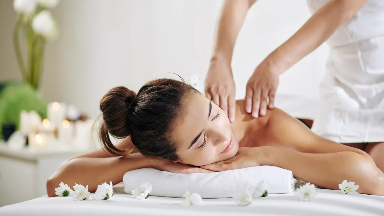Physiotherapist providing treatment for neck pain