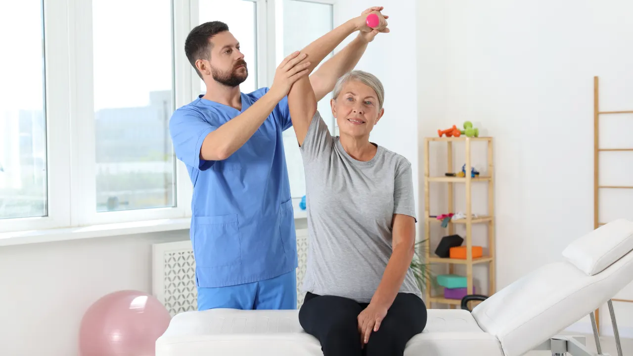 Physiotherapist providing treatment for neck pain