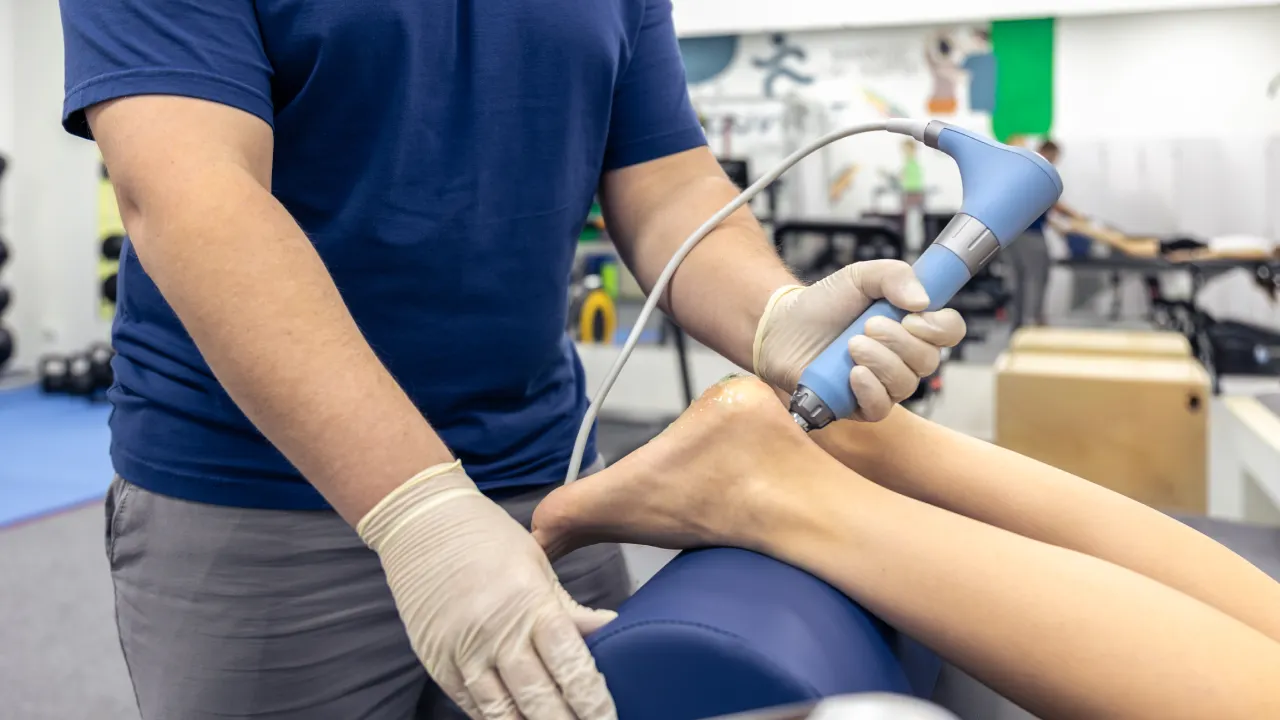 Physiotherapist providing treatment for neck pain