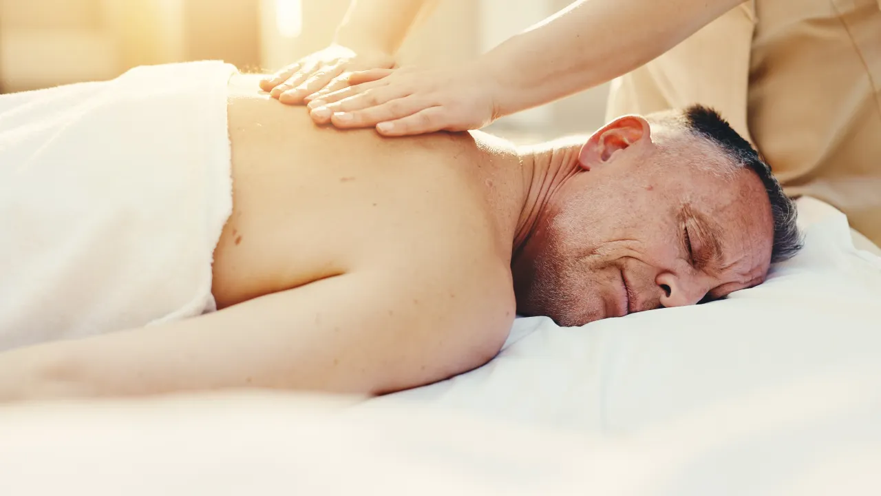 Physiotherapist providing treatment for neck pain