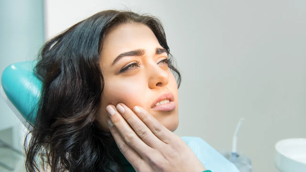 Physiotherapist providing treatment for neck pain